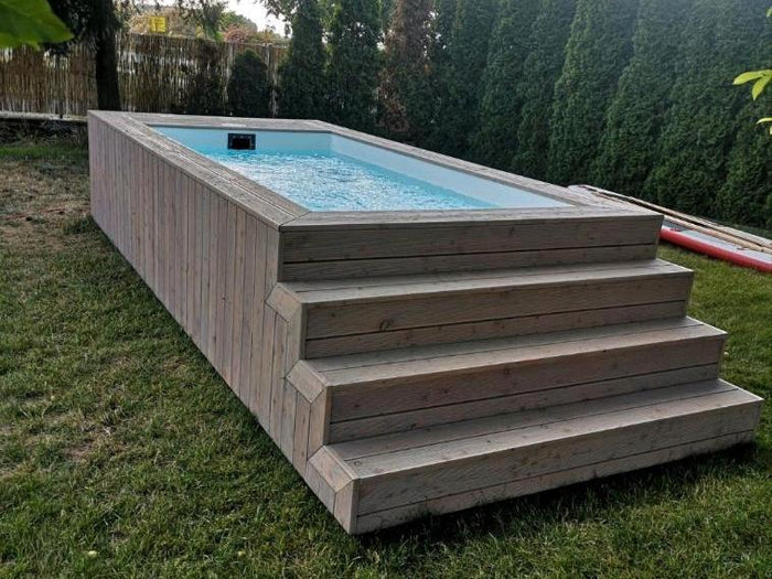 PISCINA CONTENEDOR CON REVESTIMIENTO DE MADERA